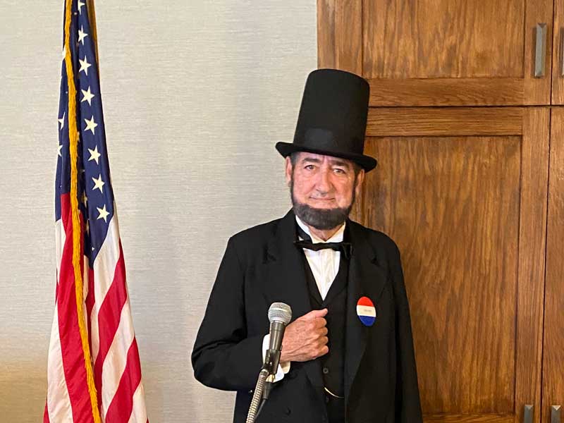 Rick Otey, portraying President Lincoln